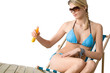 Beach - Young woman in bikini apply suntan lotion