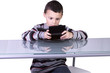 © Mehmet Dilsiz - Little Boy Playing Video Games