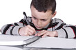 © Mehmet Dilsiz - Little Cute Boy Practicing His Writing Skills