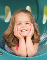 Wall Mural - Girl Playing at the Playground