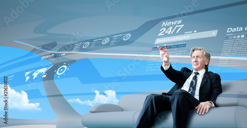 Fotografía Senior businessman navigating news interface in future