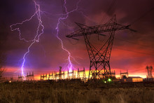 Power Distribution Station With Lightning Strike.