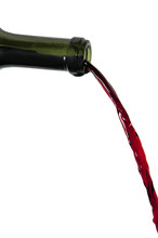 Red Wine Pouring Out Of Bottle