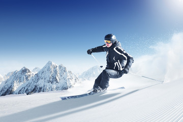 Skier in high mountains - alpen