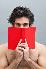 Wall Mural - College student reading an interesting book