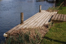 Small Wooden Mooring Platform With Posts