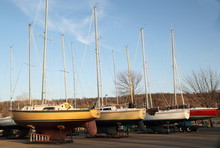 Row Of Sail Boats Stored On Land