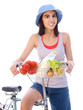 girl on the bicycle with fresh groceries