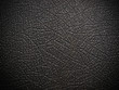 © lolloj - shiny black leather background close up