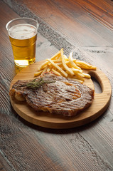 Wall Mural - grilled porterhouse with french fry and beer