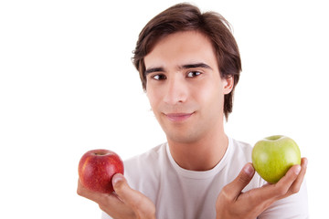 Portrait of a young man with two apples in their hands