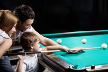 The Family Plays Billiards