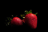 Fototapeta  - Strawberries on black background