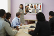 © Blend Images - Multi-ethnic businesspeople having video conference
