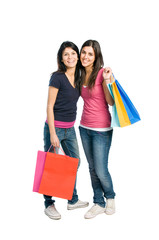 Two happy brunette girls doing shopping