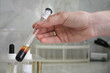 © milka-kotka - Test tube with blood in his hand