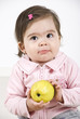 Silky baby holding an apple