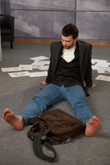 Canvas Print - Trendy office worker on floor