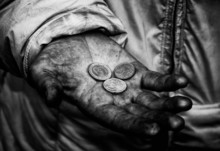 Dirty Hands Of A Beggar Whith Some Coins