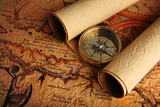 Fototapeta Mapy - Compass and a map