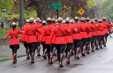 Troop Of Canadian Mountie Police Marching