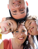 Fototapeta Krajobraz - Closeup portrait of a happy family in circle