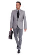© get4net - Businessman carrying briefcase and walking