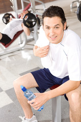 Canvas Print - Attractive sportsman in the gym