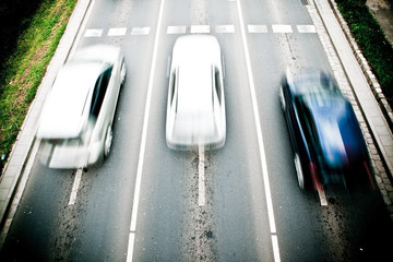 Cars in motion blur on a street of Wroclaw - city with the bigge