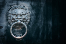 Antique Oriental Door Knocker .