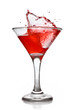 © artjazz - Red cocktail with splash isolated on white
