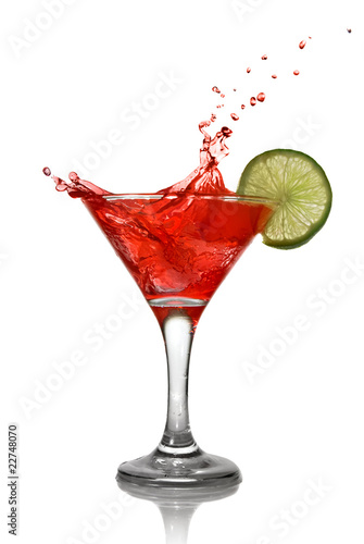 Fotografie, Obraz Red cocktail with splash and lime isolated on white