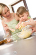 © CandyBox Images - Baking - Woman with child preparing dough