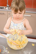 © CandyBox Images - Child baking - little girl kneading dough