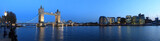 Fototapeta Londyn - Tower Bridge and the Thames panoramic view about London at night