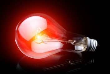 Photo of light bulb on black background