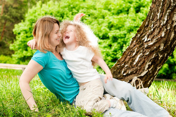 Poster - mother playing with her daughter