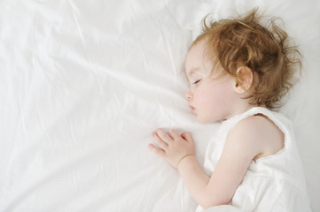 Adorable toddler girl sleeping