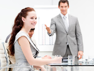 Wall Mural - Portrait of a concentrated businesswoman during a meeting