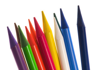 Collection of colorful pens over white background