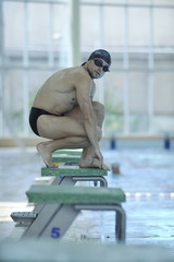 Wall Mural - young swimmer ready for start