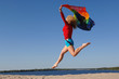 © darko64 - WOMAN JUMPING ON THE BEACH
