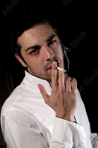 Uomo Che Fuma Una Sigaretta Buy This Stock Photo And Explore Similar Images At Adobe Stock Adobe Stock