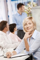 Sticker - Businesswoman making notes on meeting