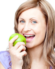 Wall Mural - Beautiful woman holding an apple