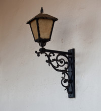 Ornate Glass Lantern Against Wall