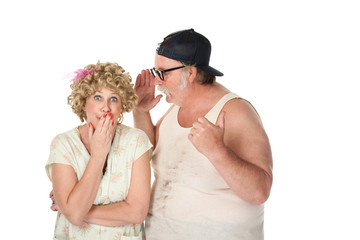 Wall Mural - Man sharing a secret with a woman on white background