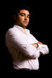 © cristovao31 - Portrait of young attractive man on black background