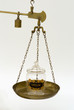 Opium glass jar container on weighing scale pan