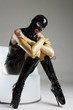 © Richard Semik - woman in latex sitting on the chair